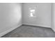 A bedroom with carpeted floors and neutral walls at 2137 Ringgold Ave, Indianapolis, IN 46203