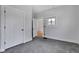 Carpeted bedroom featuring classic doors and trim at 2137 Ringgold Ave, Indianapolis, IN 46203
