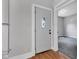 The entryway features hardwood floors and an art deco front door at 2137 Ringgold Ave, Indianapolis, IN 46203