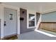 Inviting front porch with a white front door and a view of the street at 2137 Ringgold Ave, Indianapolis, IN 46203