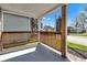 Inviting front porch with wooden railing and a view of the neighborhood at 2137 Ringgold Ave, Indianapolis, IN 46203