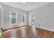 Bright living room with hardwood floors and two windows offering natural light at 2137 Ringgold Ave, Indianapolis, IN 46203