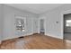 Cozy living room with hardwood floors and neutral paint, offering a versatile space at 2137 Ringgold Ave, Indianapolis, IN 46203