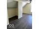 Bedroom with closet and dark gray flooring at 902 W Main St, Greenfield, IN 46140