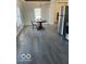 Dining area with dark gray flooring and a chandelier at 902 W Main St, Greenfield, IN 46140