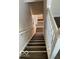 White staircase with dark gray flooring at 902 W Main St, Greenfield, IN 46140