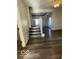 White staircase leading to the second floor at 902 W Main St, Greenfield, IN 46140