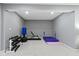Unfinished basement featuring exercise equipment and ample storage at 11633 Trail Ridge Pl, Zionsville, IN 46077