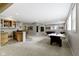 Basement area with a wet bar, carpeted floor, and recessed lighting at 11633 Trail Ridge Pl, Zionsville, IN 46077