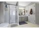 Bathroom featuring glass enclosed shower and modern vanity at 11633 Trail Ridge Pl, Zionsville, IN 46077
