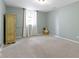 Bedroom with large window, neutral carpet, and ample natural light at 11633 Trail Ridge Pl, Zionsville, IN 46077