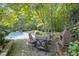 Outdoor oasis with pool, fireplace and patio area at 11633 Trail Ridge Pl, Zionsville, IN 46077