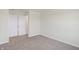 Bright bedroom featuring carpet, neutral walls, and double doors to closet at 3885 Wren Dr, Brownsburg, IN 46112