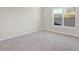 Well-lit bedroom with carpet flooring and a window at 3885 Wren Dr, Brownsburg, IN 46112