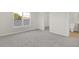 Bedroom with window, carpet, and access to bathroom and closet at 3885 Wren Dr, Brownsburg, IN 46112