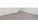 Simple bedroom with carpet, neutral walls, and a door at 3885 Wren Dr, Brownsburg, IN 46112