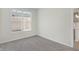 Spacious bedroom with neutral carpeting and large window at 3885 Wren Dr, Brownsburg, IN 46112