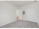 Spacious bedroom with neutral carpeting and access to another room at 3885 Wren Dr, Brownsburg, IN 46112