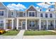 Two story townhouses with gray siding and stone accents at 3885 Wren Dr, Brownsburg, IN 46112