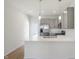 Modern kitchen with gray cabinets and stainless steel appliances at 3885 Wren Dr, Brownsburg, IN 46112