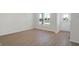 Living room with hardwood floors and exterior view at 3885 Wren Dr, Brownsburg, IN 46112