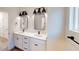 Clean bathroom with double vanity and black accents at 9870 Bucklebury Ln, Carmel, IN 46280