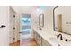 Modern bathroom with double vanity and matte black fixtures at 9870 Bucklebury Ln, Carmel, IN 46280