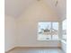 Spacious bedroom with large windows and vaulted ceilings at 9870 Bucklebury Ln, Carmel, IN 46280
