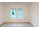 Spacious bedroom with new carpet and two large windows at 9870 Bucklebury Ln, Carmel, IN 46280