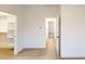 Simple bedroom with access to closet and hallway at 9870 Bucklebury Ln, Carmel, IN 46280
