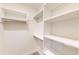Large walk-in closet with shelves and hanging rods at 9870 Bucklebury Ln, Carmel, IN 46280