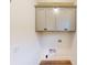 Laundry room with upper cabinets and hookups at 9870 Bucklebury Ln, Carmel, IN 46280