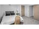 Bedroom featuring a neutral color palette, closet and a comfortable bed with plush pillows at 1210 Finley Ave, Indianapolis, IN 46203