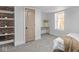 Bedroom featuring a neutral color palette, closet and a comfortable bed with plush pillows at 1210 Finley Ave, Indianapolis, IN 46203