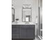 Modern bathroom featuring double sinks, stylish vanity, and a glass enclosed shower at 1659 Midland Main St, Westfield, IN 46074