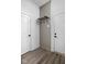 Entryway with a vertical accent wall, shelf and hooks at 1659 Midland Main St, Westfield, IN 46074