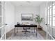 Inviting home office with a modern desk, comfortable chair, and ample natural light at 1659 Midland Main St, Westfield, IN 46074