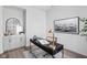 Bright home office featuring a modern desk, a comfortable chair, and a built-in bar at 1659 Midland Main St, Westfield, IN 46074