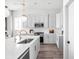 Bright and spacious kitchen with island seating, stainless steel appliances, and ample counter space at 1659 Midland Main St, Westfield, IN 46074