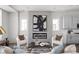 Cozy living room with a modern fireplace, stylish seating, and tasteful decor at 1659 Midland Main St, Westfield, IN 46074