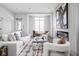 Inviting living room featuring stylish furnishings, a cozy fireplace, and lots of natural light at 1659 Midland Main St, Westfield, IN 46074