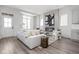 Bright living room featuring a modern fireplace, neutral tones, and lots of natural light at 1659 Midland Main St, Westfield, IN 46074