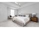 Bright main bedroom features a cozy sitting area and a well-lit bedside table at 1659 Midland Main St, Westfield, IN 46074