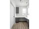 Home office with L-shaped desk and ample natural light at 1659 Midland Main St, Westfield, IN 46074