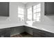 Bright home office with built-in desks and corner windows at 1659 Midland Main St, Westfield, IN 46074