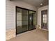 Sliding glass doors leading to a covered patio at 1659 Midland Main St, Westfield, IN 46074