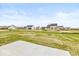 New construction backyard with concrete patio at 1099 Gatewick Ct, Greenwood, IN 46143