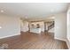 Open concept living space seamlessly connecting the living room and modern kitchen at 1099 Gatewick Ct, Greenwood, IN 46143