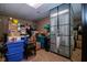 Basement storage area featuring an innovative frosted glass partition, perfect for organizing your belongings at 5964 Laramie Trl, Columbus, IN 47203