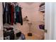 Walk-in closet with wire shelving and wood-look tile floors at 5964 Laramie Trl, Columbus, IN 47203